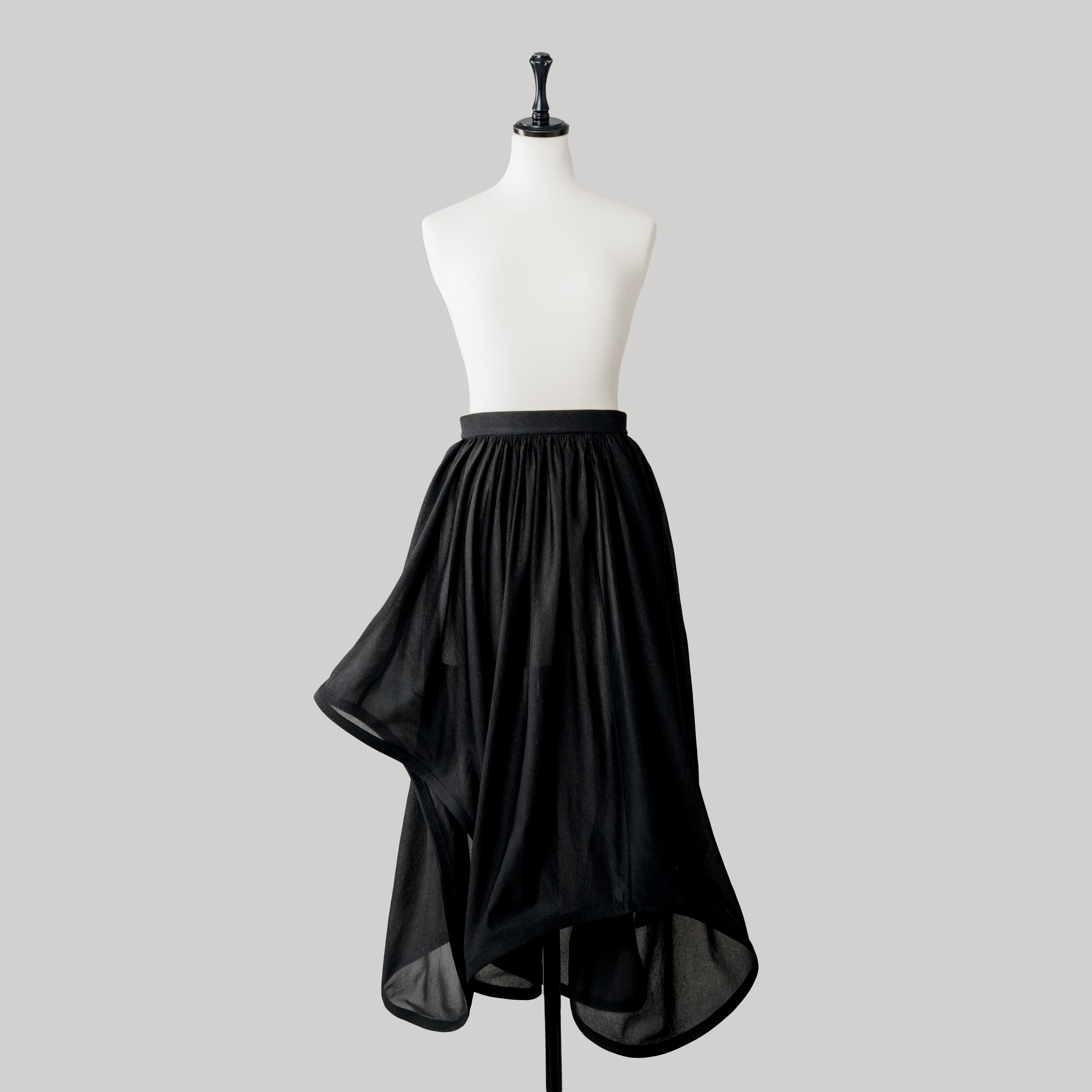 CURL ASYMMETRY SKIRTS