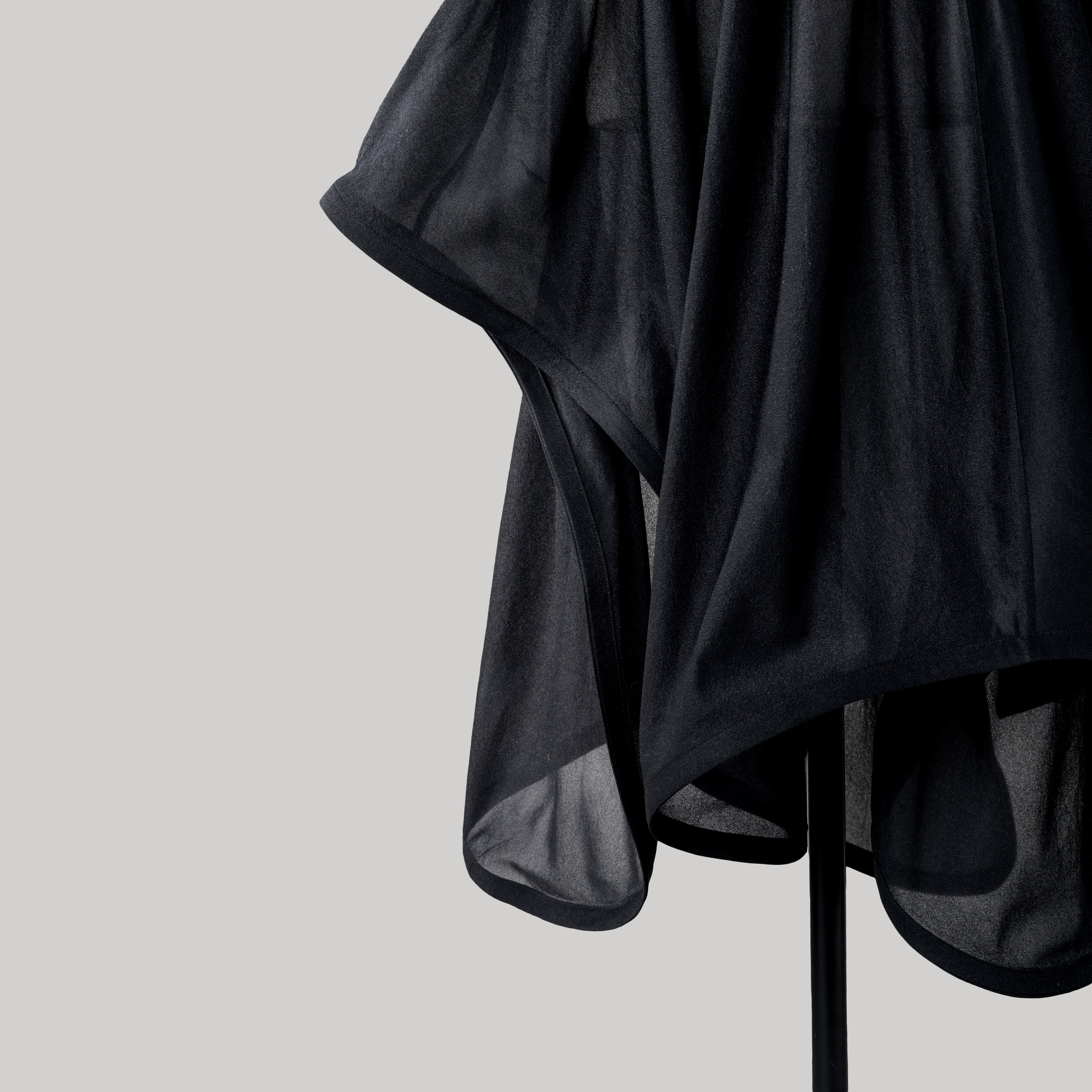 CURL ASYMMETRY SKIRTS